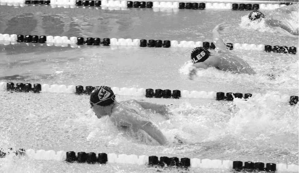 Oles host Northfield Quad Classic: Swim team tallies victories, Brebrick 16 breaks pool record