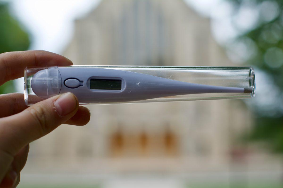 A thermometer provided by the College is held in front of Boe Chapel. Jorie Van Nest/The Olaf Messenger