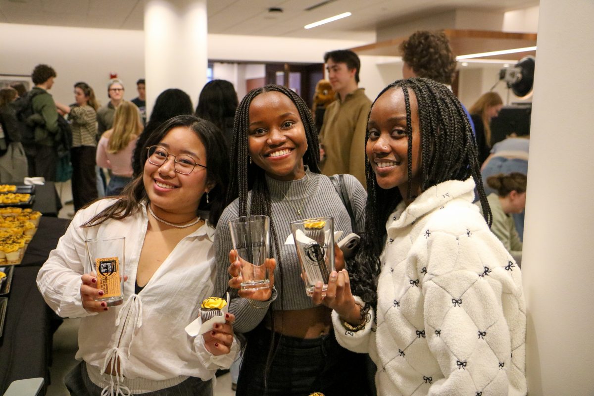 Three seniors pose during the 100 Days celebration in King's Dining Hall. 