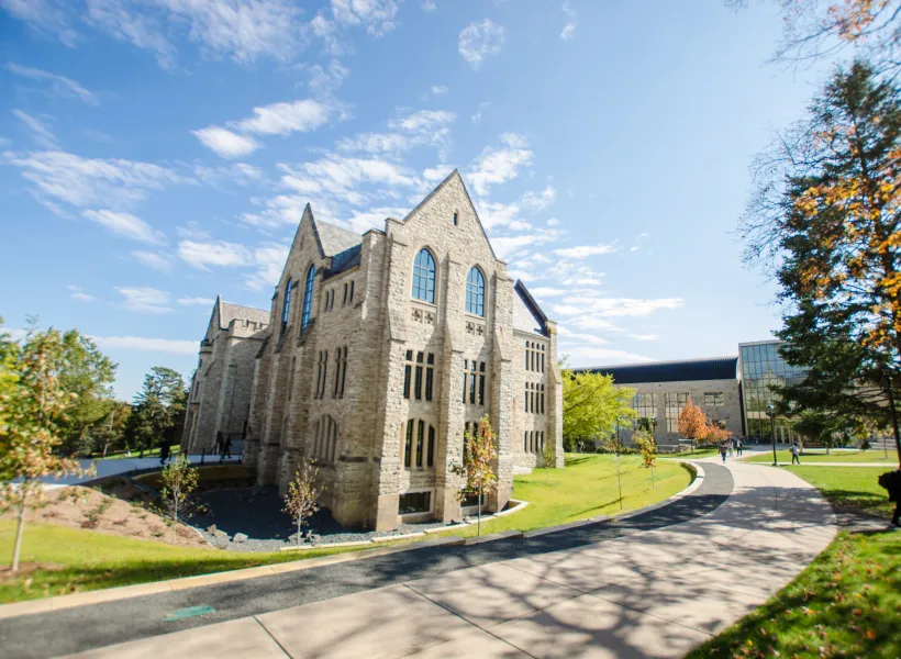 The campus of St. Olaf College, which enrolls just over 3,000 undergraduate students, with about 99% receiving financial aid and roughly 75% awarded merit-based scholarships.