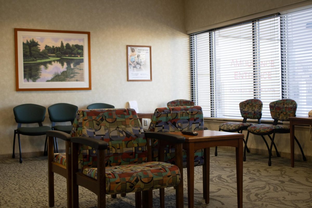 The emergency department waiting room at Northfield Hospital + Clinics sits empty. Uninsured patients qualify only for emergency-only medical assistance, which covers care when conditions become life-threatening.